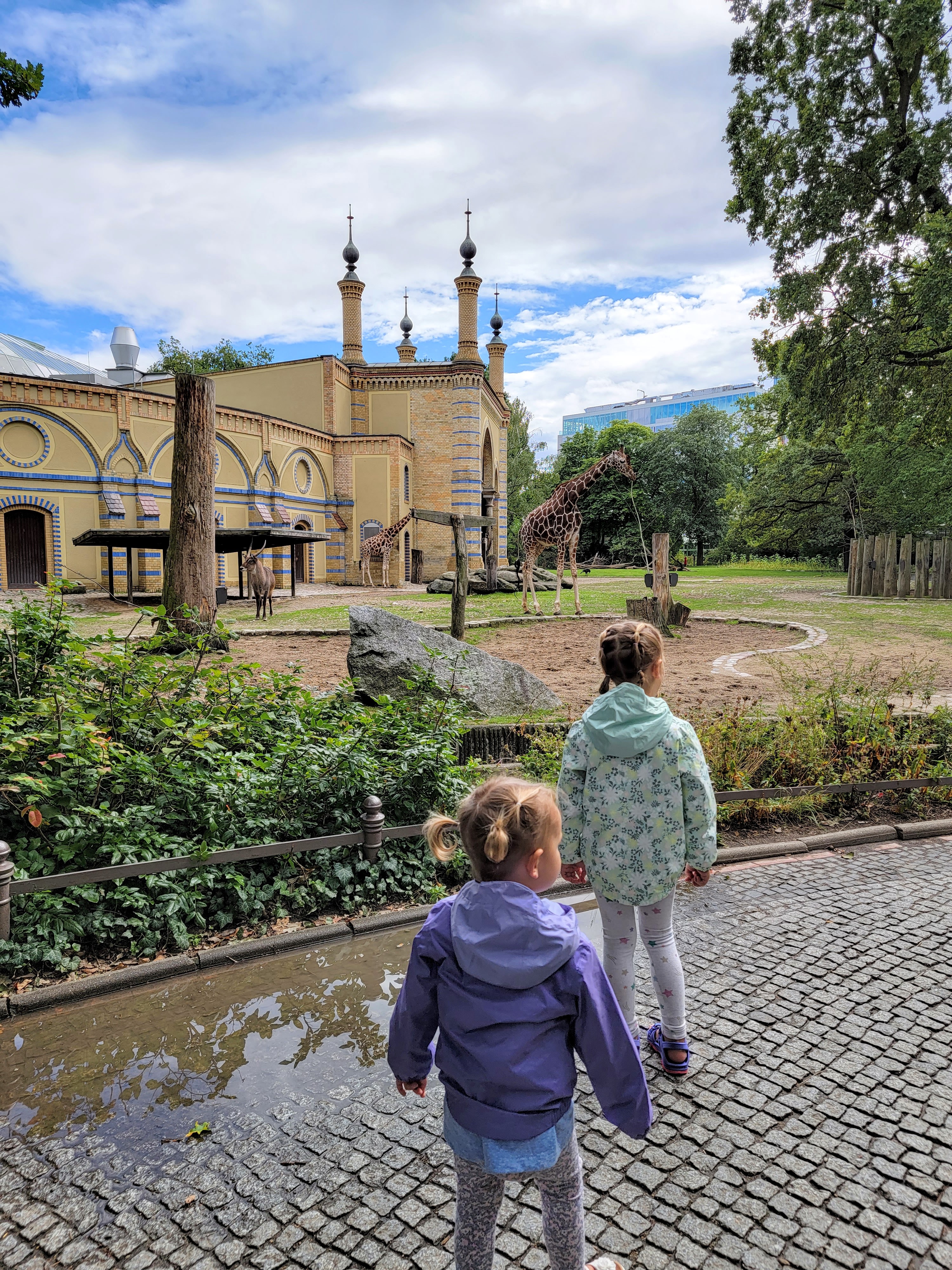 Vast Berlin Zoo grounds with families walking